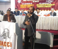 Delivering speech at Conference
